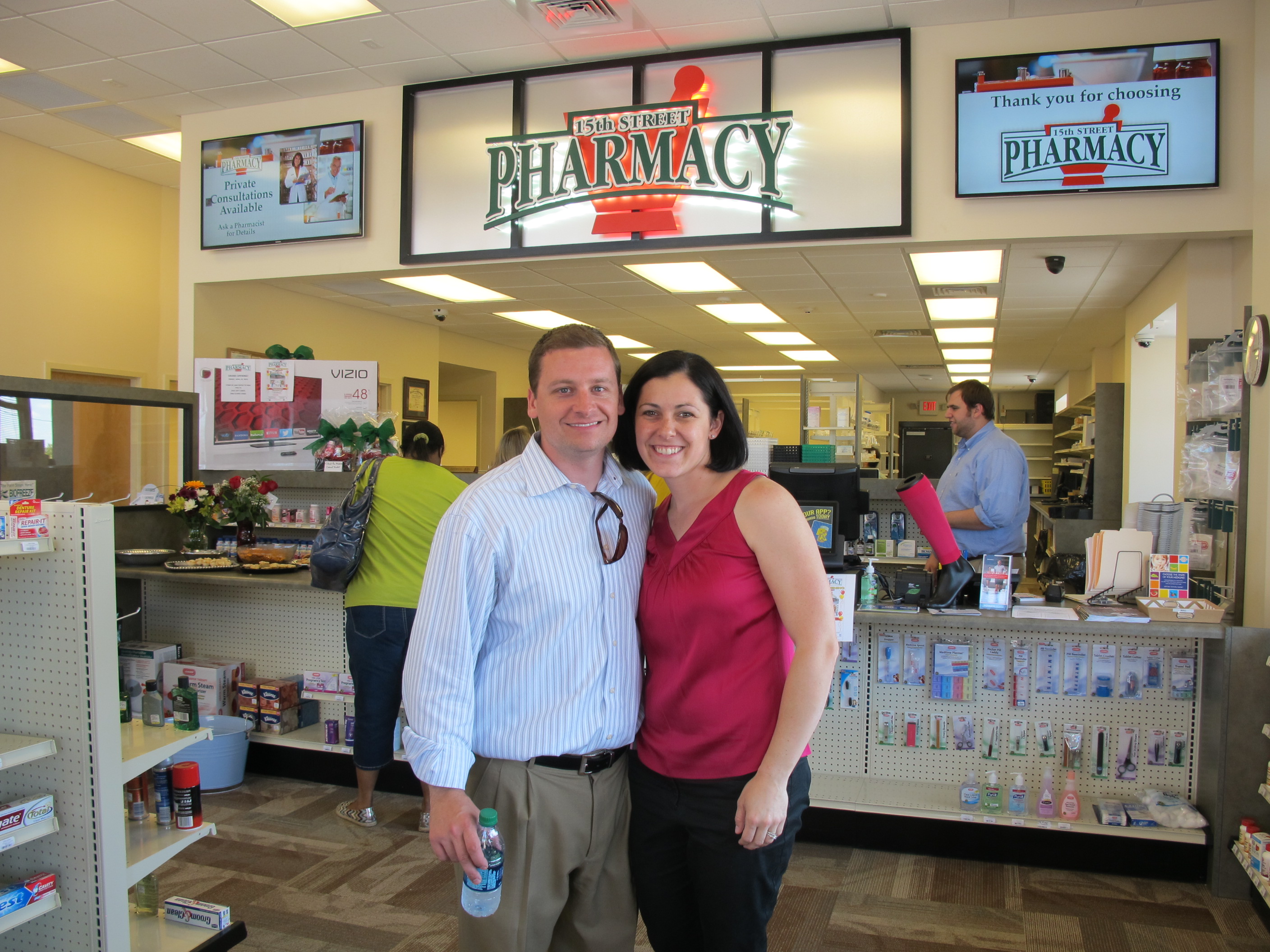 Matt and Amy Bogue at Grand Opening of 15th Street Pharmacy in Tuscaloosa
